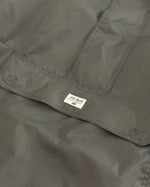 Rompeviento gris impermeable y térmico